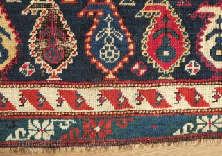 Shirvan Prayer Rug, 4th quarter of 19th Century.  Deep indigo blue ground and wonderful botehs in alternating directions.  The serrations around the botehs have the appearance of small "horns" on  ...