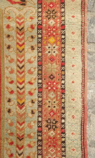 Kirshehir prayer rug, late 19th/early 20th century.  Evocative Ottoman design.  Beautifully composed motifs in the spandrels.  Note the pole-trees flanking both sides of the field.  A couple small  ...