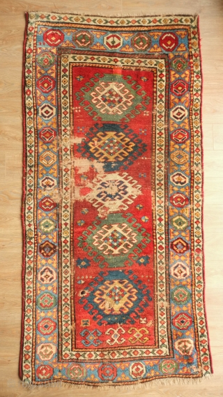 Kazak Borchalu rug, Mid-19th century, possibly earlier.  Smaller format.  Thick pile.  Noticeable wear but a fantastic example.  93 x 192 cm        