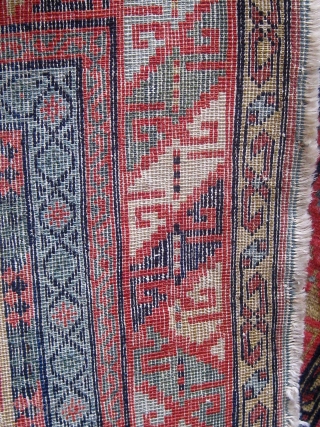 Antique South Caucasian small rug (Kuba?), extremely fine weave, velvety feel, all natural dyes, cotton foundation (warps and wefts), beautiful olive green field, in lovely condition, and basically complete with three cord  ...
