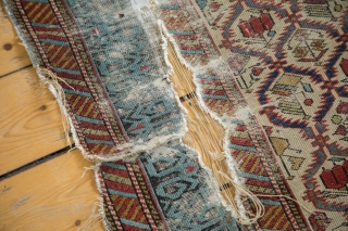 Old Caucasian rug. Signed. Used and enjoyed, stains present, see photos. Great colors, great border. 3'10" x 5'8". Contact for more info.           