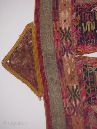 This turkmen child kirlik is an hand stitched silk on cotton in a fair condition
the wear on some spots shows that it was used by a very active child for a long  ...