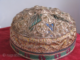 This zardozi hat is from Badakhshan northern Afghanistan and it's tajik tribe.It is called,  
*zardozi because the metallic threads are usually bin wrapped with real gold or silver in the very  ...