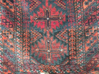 Here is an old baluch balisht with nice blue green background very soft silky wool all natural colors,it still has the backing           