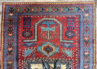 Antique Caucasian Karachov Kazak Rug -Approximately 52" by 77"
This is a turn of the century Caucasian Kazak rug from the Karachov region. It has great graphics and good colors. It features a  ...