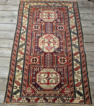 19th Century Caucasian Rug -Dagestan? 3.5 ft. by 5.5 ft.
Classic 3 medallion design. All original, very low pile, small areas of exposed foundation, missing end borders (see photos 3 and 4).  