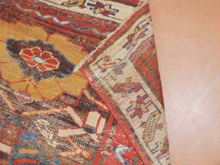 3.6x8 early kurdish rug 
it appears that it has a rewoven ends and sides                   