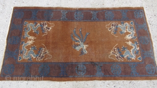 Art Deco 20C Chinese Peking wool woven dragon rug.
Chinese wool dragon rug, hand woven, has 4 dragon and Phoenix in center with auspicious symbols around the frame, in its original vintage condition,  ...