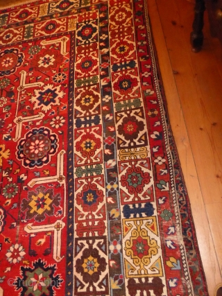 Coming soon ... Rather beautiful, with a bright festive red ground, this Shriven/Kuba small carpet is unusual for it's size; it has an attractive field of stylised floral medallions, enclosed within a  ...