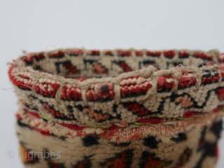 Fragmented 'transcaucasian '( mainly ) bag . Ca ; 18 cm x 32 cm . thick,   long wool and  colors.          