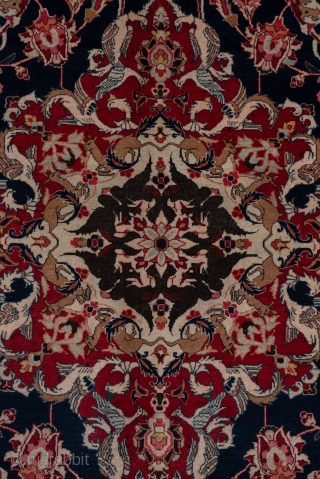 Kashan Carpet

9.0 x 11.7
2.74 x 3.56

The almost blue-black field displays an ivory medallion around which swirl layers of forked rinceaux with a variety of regular and iris palmettes and various floral   ...