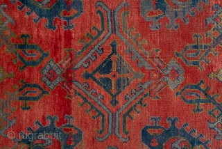 Oushak Carpet

14.0 x 18.2
4.26 x 5.54

The  abrashed soft madder red field of this western Turkish workshop carpet displays an allover yaprak ("leaf") pattern mixing  ragged palmettes and broken, hooked lozenges  ...