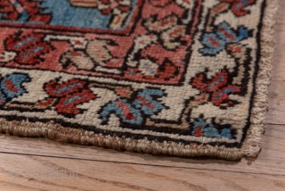 Heriz Carpet

10.9 x 14.9
3.32 x 4.54 

Of higher Serapi grade, this NW Persian village carpet displays a terra cotta red subfield centred by a palmette pendanted navy nested medallion with ivory Herati  ...