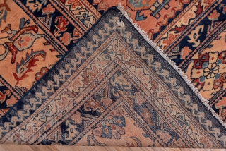 Lilian Carpet

12.3 x 19.0
3.74 x 5.79

This Hamadan area roomsize has a dark blue  octagonal subfield edged with tiny botehs and a classic Herati design overall. Double vases with jagged leaves decorate  ...