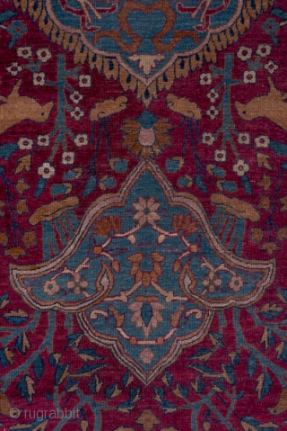 Indo-Kerman Carpet

14.6 by 16.2
4.45 x 4.93

The red field of this Indian adaptation of Kerman Persian sources displays cypress trees, prunus shrubs, various other flowing bushes and a number of jungle animals. The  ...