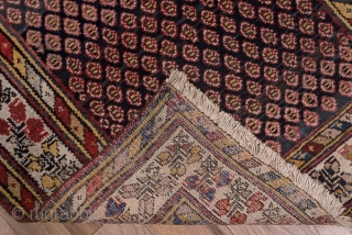 Malayer Runner

3.1 x 12.6
0.94 x 3.84

The  abrashed charcoal field features a close seme of tiny ovals within an ivory triple flower border in the Turkish manner and flanking diagonal colour-striped minors.  ...