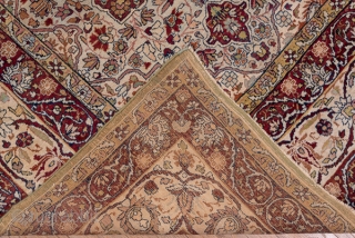 Kerman Carpet

9.0 x 12.0
2.74 x 3.65

On an old ivory field are set four eight-point red star medallions around which swirl flowering vines. The ivory main border of this SE Persian city carpet  ...
