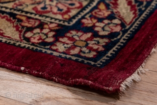 Kerman Carpet

9.0 by 12.3
2.74 x 3.74

The crisp cochineal red field displays a giant, lobed ivory medallion with dark blue interior spadiform palmettes. The ivory corners feature split navy arabesques and the main  ...