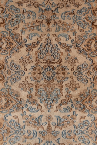 Kerman Runner

2.9 by 17.0
0.88 x 5.18

This ivory ground SE Persian city runner displays a detached flower spray pattern in light blue, sienna brown, pistachio, buff, salmon   and tan, all within  ...