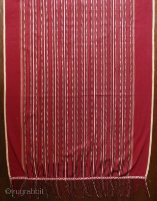 Sumatra | early 20th C Batak ceremonial textile Ulos Mangiring 

Sumatra, Batak people, Toba, Silindung; c. 1930

Commercial cotton, natural and commercial dyes, warp ikat, continuous supplementary warp weaving

A single dark rose red  ...