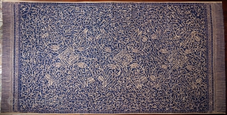 Sumatra | Calligraphic batik with birds (batik tulisan Arab burong)

Coffin cover or hanging

Sumatra, Bengkulu, c. 1940

Commercial cotton and dye, hand-drawn batik (tulis)
 
A graphic dark blue Batik Tulisan Arab hand-drawn with the  ...