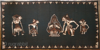 Javanese Batik Wall Hanging with Wayang Figures
 
Origin: Indonesia, Java, Jogjakarta, 1940 – 1960

Technique: Commercial cotton, mixed dyes, hand-drawn (tulis) batik

Description: A dramatic batik hanging from Jogjakarta, hand-drawn with wayang kulit (shadow  ...