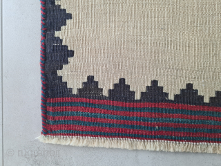 Persian Bakhtiary or Luri sofreh kilim with minimalistic nomadic pattern and naturel dyes. Two small not visible repairs in the  bright area. The edges are bordered

158x108cm 

Probably wovrn in the first  ...