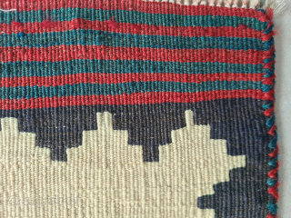 Persian Bakhtiary or Luri sofreh kilim with minimalistic nomadic pattern and naturel dyes. Two small not visible repairs in the  bright area. The edges are bordered

158x108cm 

Probably wovrn in the first  ...