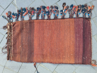 Antique Baluchi bag with a beautiful pattern and glass/ceramic beads. Dimensions: 110 x 56 cm In used condition, cleaned

Please contact me only directly:

goekay.sargin@yahoo.de          