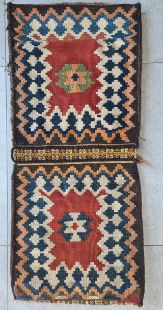 Rare Gabbeh saddlebag of the Ghashghai nomads with a beautiful kilim back (pattern like sofreh kilims). The front also has a rare pattern. Overall in good condition, full pile. Dimensions: ~ 95x45cm


Worldwide  ...