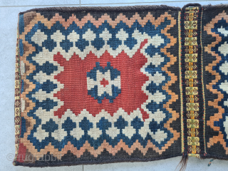 Rare Gabbeh saddlebag of the Ghashghai nomads with a beautiful kilim back (pattern like sofreh kilims). The front also has a rare pattern. Overall in good condition, full pile. Dimensions: ~ 95x45cm


Worldwide  ...