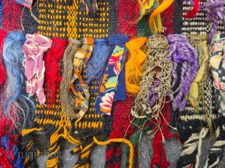 Beautiful nomadic horse blanket from Southeast Anatolia (area between Adana, Urfa and Gaziantep) with interesting metal threads, mohair braids and fabric decorations. Woven in three panels using the Cicim technique. Nice tribal  ...