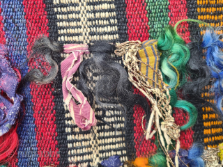 Beautiful nomadic horse blanket from Southeast Anatolia (area between Adana, Urfa and Gaziantep) with interesting metal threads, mohair braids and fabric decorations. Woven in three panels using the Cicim technique. Nice tribal  ...