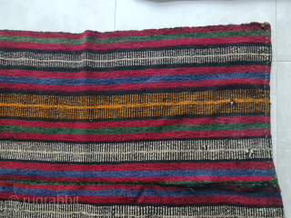 Beautiful nomadic horse blanket from southeast anatolia (probably Reyhanli or Rashwan tribe) with interesting metal threads, mohair braids and fabric decorations. Woven in three panels using the Cicim technique. Nice tribal piece.  ...