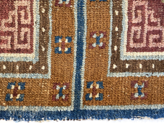 Antique Tibetan seating mat, with interesting colours
1.11m by 0.61m


Contact gene@heritage-antique-rugs.com for more pics, price etc.                  