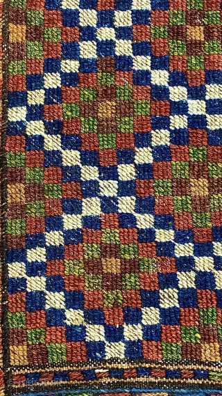 Quchan Kurd Soumac small carpet, ca.1890;
5’4” x 8’11” / 163 x 272 cm.  Field populated by a 
diaper pattern of concentric stepped diamonds, 
with an “elem” panel of diamonds set between  ...
