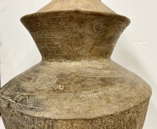 Bang Chaing Ceramic Vessel, Thailand, ca. 2nd Millennium BCE;

Height: 18”/ 46cm.

Opening Diameter: 4”/ 10cm.

Maximum width-Diameter: 11”/ 28 cm.

Base Diameter: 6 1/2” /  16.5 cm.

Ancient ceramic with incised decorations of dragons or  ...
