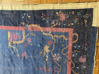 Chinese carpet, ca. 1900; 9’11 x 13’2” / 302 x 401 cm. 

Exceptionally glossy wool with hand-spun warps, flowering gnarled trees with butterflies and birds in field, medium blue 

ground, solid red  ...