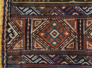 Kurd Qoo-chan Soumac Bagface, ca.1890; 2’9 x 2’4” / 79 x 71 cm.

Decorated with bands of hooked diamonds not unlike symbols seen

on Jaf Kurdish work here set in boxes. Halved diamonds fill  ...