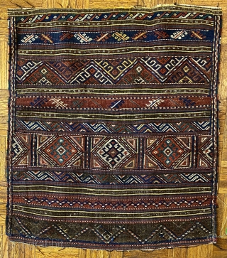 Kurd Qoo-chan Soumac Bagface, ca.1890; 2’9 x 2’4” / 79 x 71 cm.

Decorated with bands of hooked diamonds not unlike symbols seen

on Jaf Kurdish work here set in boxes. Halved diamonds fill  ...