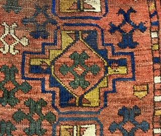 Uzbek Small Carpet or Large Rug, ca. 1890; 4’8” x 12’6”

Overall pattern of Chuval-gul variants with fluidly rendered totemic 

figures between.

Small areas of wear, tiny areas of repiling-please study photos carefully  