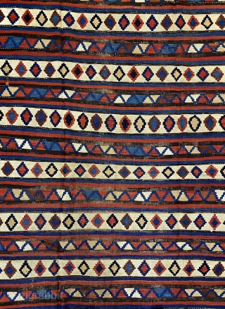 Exceptional Mid 19th C. Shir-van Kilim, ca. 1860; 5’1” x 11’11” / 155 x 363 cm.

Saturated natural colors, and fluid drawing.  Archaic features: extra band width at the ends,

and rainbow inclusions  ...