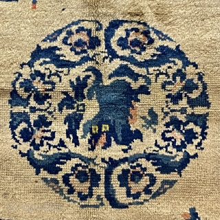 Ningshia Chinese Rug, 19th C; 3’11” x 5’ 10” / 119 x 178 cm

Foo-Dog medallion at center of field with arrangements of

meritorious “scholars’ objects”. Fret-work dragons in the 

main border woven in  ...
