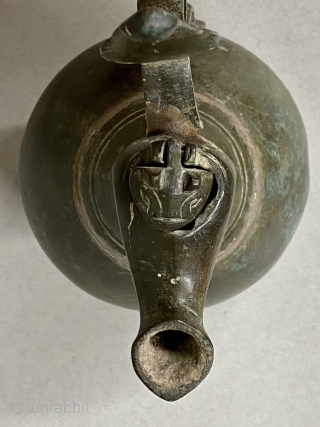Seljuk Bronze Ewer, ca. 12th Century CE;

Diameter:  4 3/8” // 11.1 cm

Height - including crest:  9 5/8” // 24.4 cm

Diameter Base: 3 5/8” // 9.2 cm

Antique, gracefully pear-shaped ancient bronze  ...