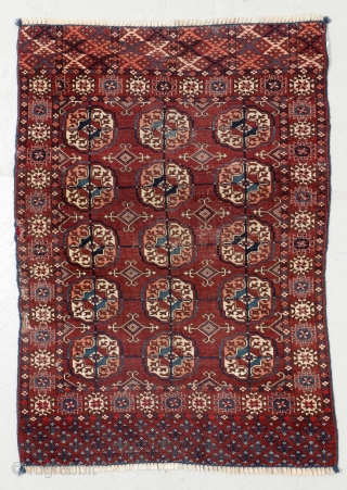 Stunning Tekke wedding rug. Beautiful coppery red and interesting seconday guls. Love the two different patterns on each elem.

3ft 1in x 4ft 1in          