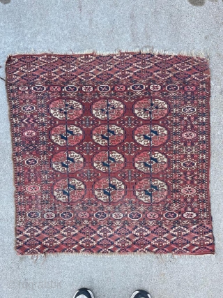 Antique Tekke sitting rug. Nice colors, no fading, fine weave. 

3'3" x 3'3"

Missing the selvedge on one side.               