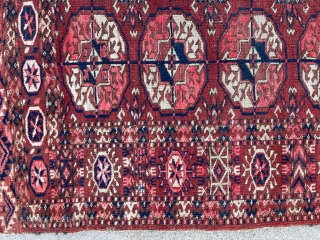 Antique Tekke sitting rug. Nice colors, no fading, fine weave. 

3'3" x 3'3"

Missing the selvedge on one side.               