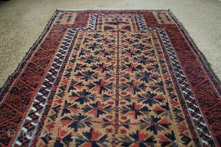 Antique Kawdani Baluch Camel wool prayer rug. Original sides and full pile except corroded dark brown/black which is typical for these. Very soft wool and amazing colors, look at that madder red!  ...