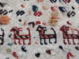 Early 1900s. Qashqai horse blanket or cover. 4ft7in x 5ft. Wonderful repeating animal figures with a few silk braids woven in here and there. A few scattered small holes but overall great  ...