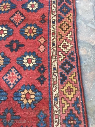 Beautiful, unique antique Uzbek rug. Near full pile on one end with medium to low pile on the rest. No visible repairs besides the selvedges rewrapped. No color runs. Definitely a striking  ...
